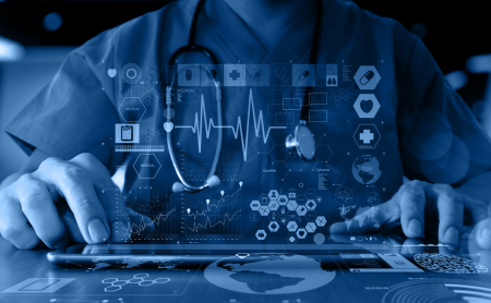 Midsection shot of a doctor using a tablet, many symbols related to technology float above the tablet, blue wash over image