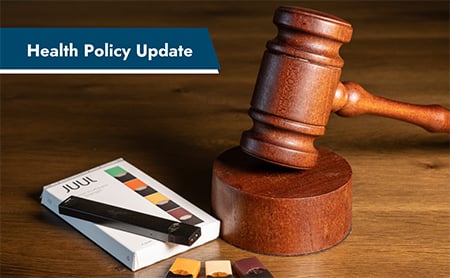 Package of JUUL vapes next to a gavel. ASTHO Health Policy Update banner in upper left