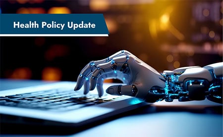 Robotic arm typing on a laptop with the text Health Policy Update overlayed