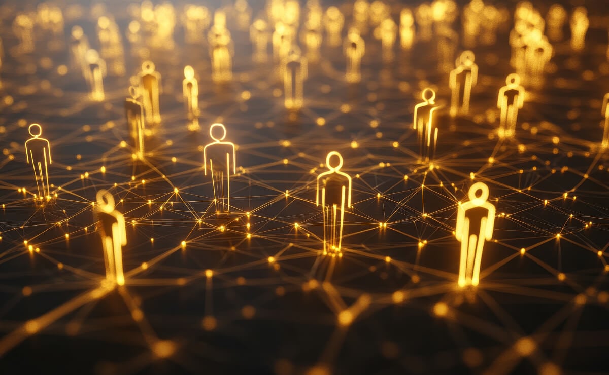 A group of gold people icons interconnected by a digital network, symbolizing collaboration and communication.